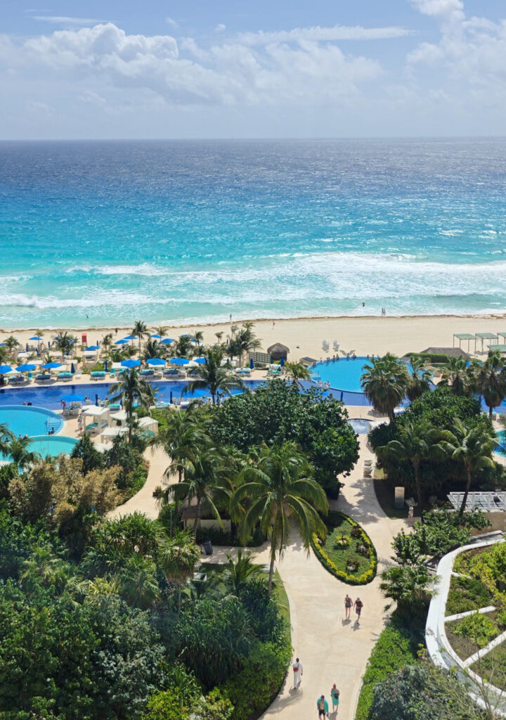 Cancun beach hotel zone with blue Caribbean sea.